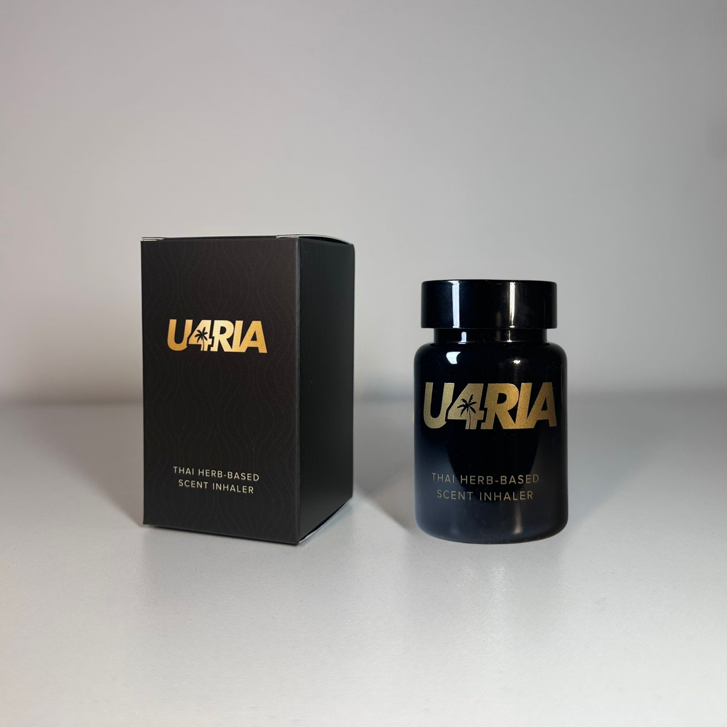 U4RIA Bottle Box and Box on plain grey background