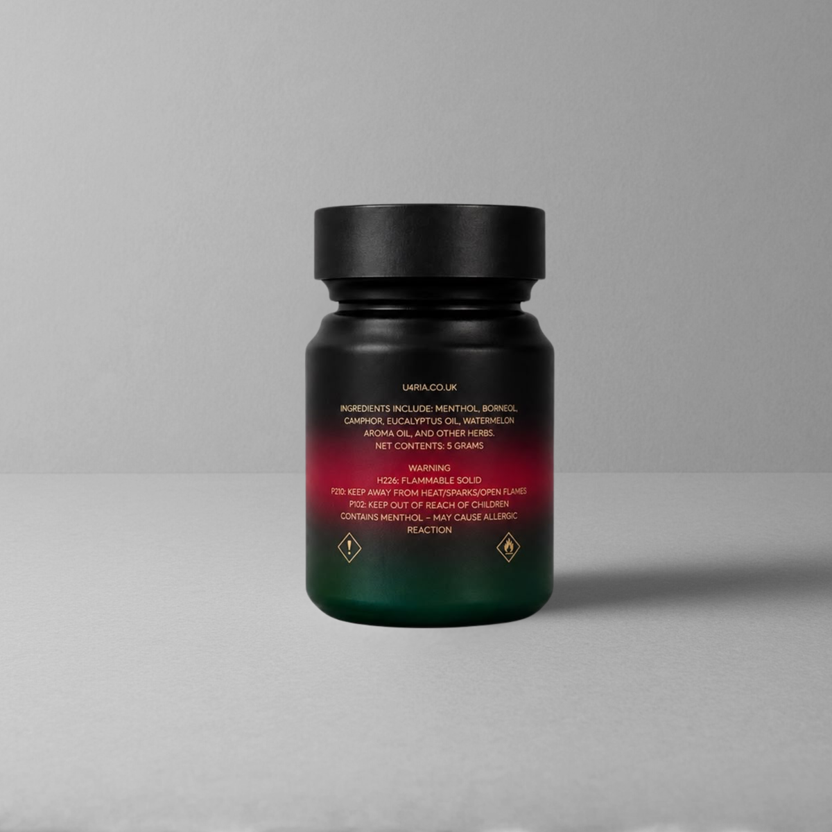 A dark green and red watermelon U4RIA bottle with a black cap, shown from the back against a neutral grey background.