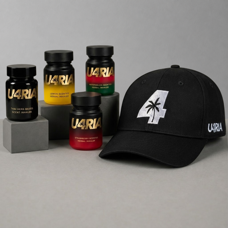 U4RIA Ritual Pack: black U4RIA cap with four herbal scent inhalers in Classic, Lemon and Strawberry on grey display blocks