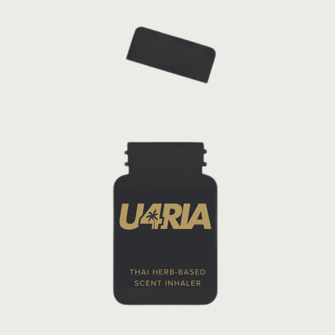 U4RIA herbal inhaler with its cap twisted off and lifted above the open bottle